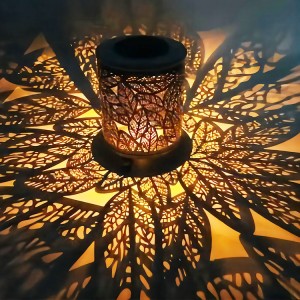Lámpara de mesa de metal hueco