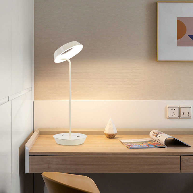 Creative desk lamp with swingable lamp head